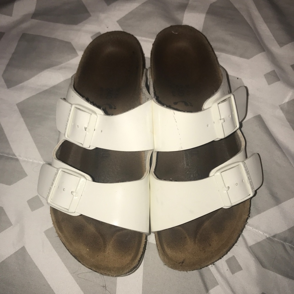 Birkenstock white leather sandals.